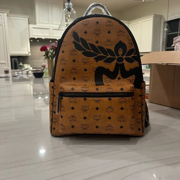 MCM Cognac Backpack with Black Visetos Pattern Small-Medium Stark Side Studs Backpack in Visetos Cognac  main image 2